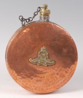 Lot 1303 - An early 20th century hammered copper flask of...