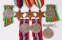 Lot 1312 - A collection of eight WW II medals to include...