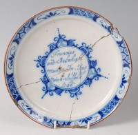 Lot 19 - A rare 18th century Delft plate, the centre...