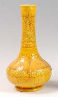 Lot 31 - A Burmantofts faience bottle vase, having a...