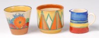Lot 66 - A Clarice Cliff Gay Day pattern pottery beaker,...