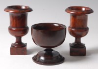 Lot 142 - A pair of late 19th century lignum vitae urns,...