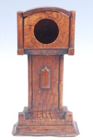 Lot 149 - A Victorian oak pocket watch holder in the...