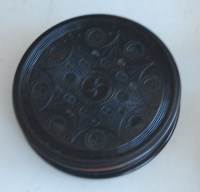 Lot 173 - A 19th century lignum vitae circular snuff-box,...