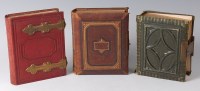 Lot 177 - Three late Victorian leather photograph albums,...