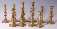 Lot 206 - Five pairs of 19th century brass candlesticks,...