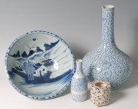 Lot 221 - A Chinese export stoneware blue and white bowl,...