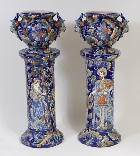 Lot 2048 - A pair of Continental majolica glazed pedestal...