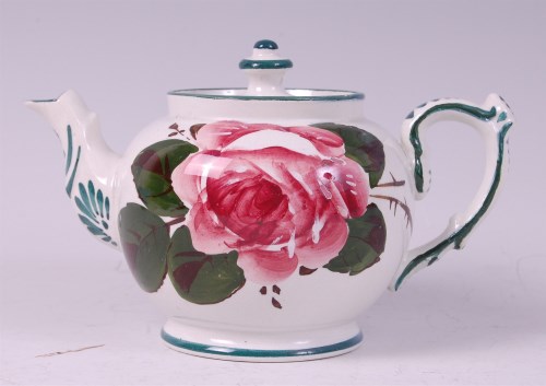 Lot 2073 - A Wemyss bachelors teapot, decorated with a...