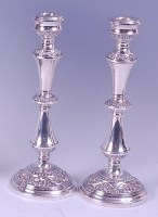 Lot 2087 - A pair of modern silver candlesticks, having...