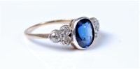 Lot 2131 - An 18ct synthetic sapphire and diamond ring,...