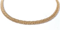 Lot 2136 - An 18ct collarette, the plaited rope style...