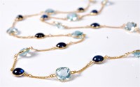Lot 2143 - An aquamarine and sapphire necklace, the...