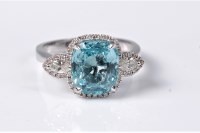 Lot 2147 - An 18ct aquamarine and diamond ring, the...