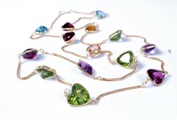 Lot 2150 - A 14ct multi-gem set necklace, the mixed cut...