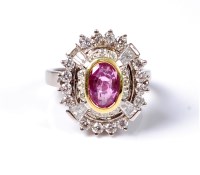 Lot 2157 - A pink sapphire and diamond ring, the oval...