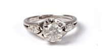Lot 2169 - An 18ct diamond ring, the central round...