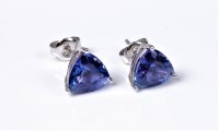 Lot 2172 - A pair of 18ct tanzanite earstuds, the...