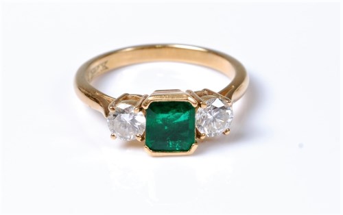Lot 2174 - An 18ct emerald and diamond ring, the square...