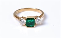 Lot 2174 - An 18ct emerald and diamond ring, the square...