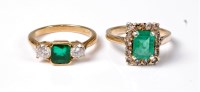 Lot 2175 - An emerald and white hardstone ring, the...