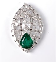 Lot 2177 - A 14ct emerald and diamond pendant, the...