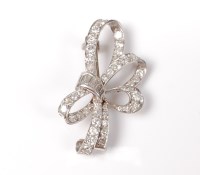 Lot 2179 - An early-mid 20th century diamond bow brooch,...