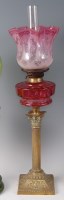 Lot 2210 - A late Victorian brass Corinthian column oil...