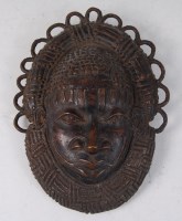 Lot 2248 - A Benin bronze mask, possibly Yoruba tribe,...