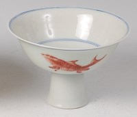 Lot 2288 - A Chinese porcelain stem bowl, the white...