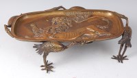 Lot 2302 - A Japanese Meiji period bronze stand, the...