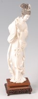 Lot 2307 - A circa 1900 Chinese carved ivory okimono of...