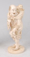 Lot 2311 - A Japanese Meiji period carved ivory okimono,...