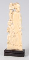 Lot 2313 - A Chinese Republic period carved ivory figure...