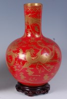 Lot 2322 - A Chinese porcelain red ground dragon vase, of...