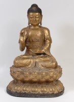 Lot 2327 - A Nepalese brass Buddha, of good size, in...