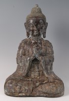 Lot 2328 - A Far Eastern bronze Buddha, in lotus pose,...