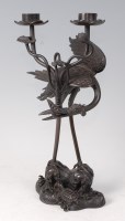 Lot 2335 - A Japanese bronze candelabra, naturalistically...