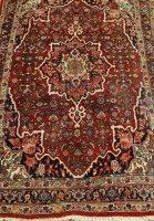 Lot 2458 - A Persian woollen Bidjar rug, the red ground...