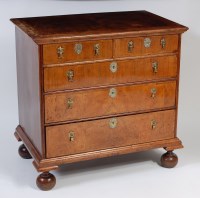 Lot 2486 - An early 18th century walnut chest, having a...