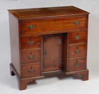 Lot 2496 - A George III and later mahogany kneehole desk,...