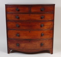 Lot 2498 - An early 19th century mahogany bowfront chest,...