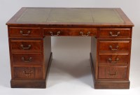 Lot 2502 - An Edwardian walnut twin pedestal writing desk,...