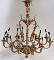 Lot 2507 - A Rococo Revival gilt metal twelve light...