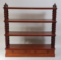 Lot 2511 - An early Victorian mahogany four-tier whatnot,...