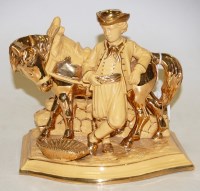 Lot 16 - An early 20th century Eichwald pottery figural...