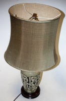 Lot 18 - A modern green glazed reticulated table lamp,...