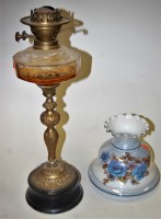 Lot 20 - A circa 1900 brass pedestal oil lamp having...