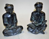 Lot 59 - A pair of 1960s American carved resin figures,...