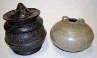 Lot 61 - A Thai Sawankhalok celadon glazed stoneware...
